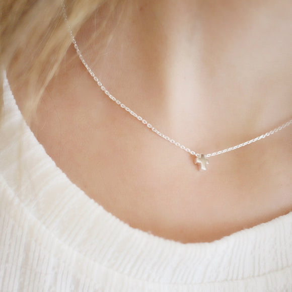 Love your faith and express it with this delicate Tiny Cross Necklace. A beautiful and timeless symbol of spirituality, it's an elegant way to show your devotion every day. Inspire yourself and those around you with this stunning reminder of faith.