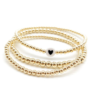 This gorgeous 14k Gold bead Bracelet is a timeless piece you'll love wearing every day. Crafted with gold for long-lasting wear and quality, its delicate heart shape adds sparkle and style to any look