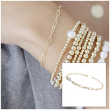 Make a timeless fashion statement with this Paperclip Chain Bracelet in Gold. Show off your style with this gorgeous piece, crafted with precision and finesse. Let this gorgeous 14k gold filled bracelet adorn your wrist and shine with your every outfit. Wear it with confidence and make heads turn