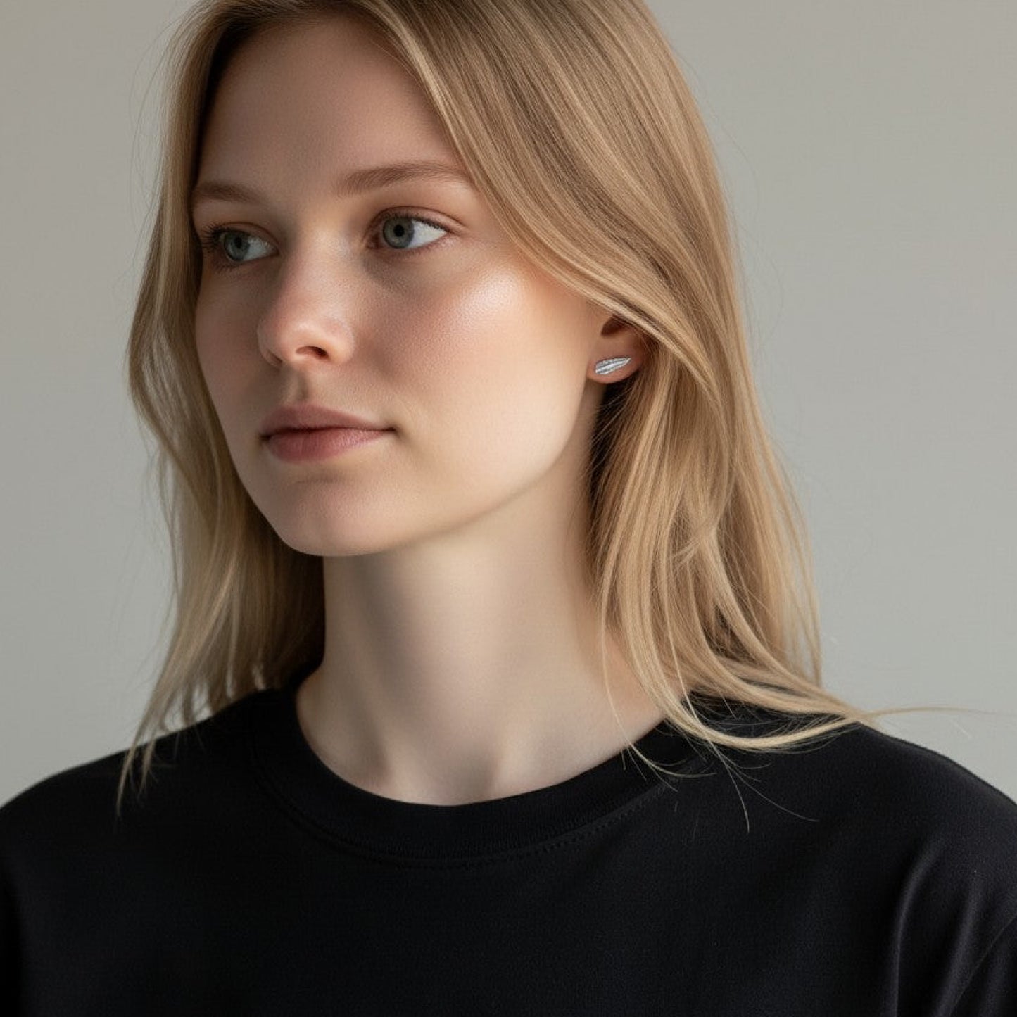 Minimalist feather stud