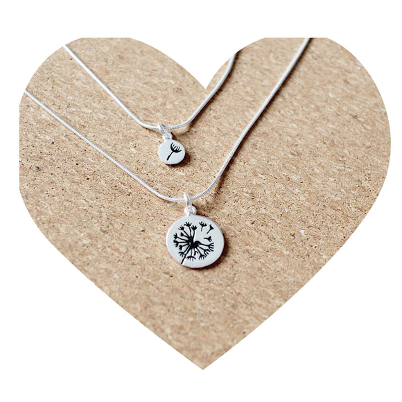 This Mother Daughter Necklace Set is a classic and thoughtful way to show the special bond between a mother and daughter. This necklace set is designed to be an everlasting reminder of the special connection between a mother and daughter, crafted with 925 Sterling Silver. Give your mother or daughter a special necklace set that they will both love. 
