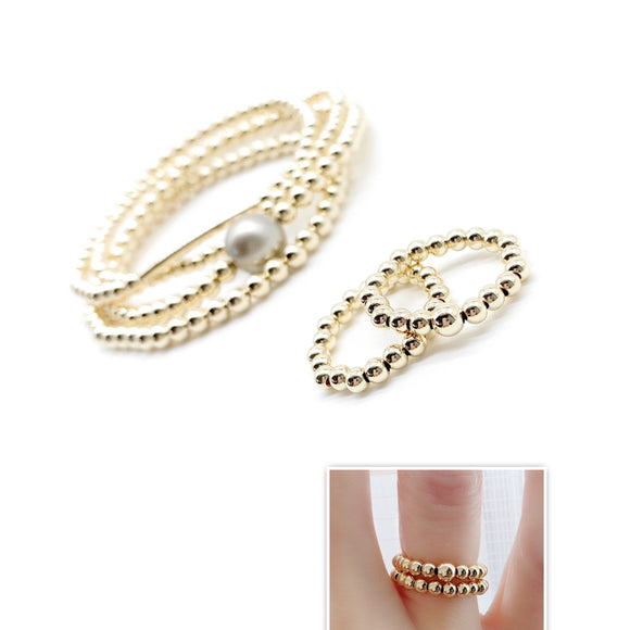 Unleash your inner fashionista with our 14k Gold filled stretch ring! No more worrying about sizes, as this ring comfortably stretches to fit any finger. Made with high-quality materials, it adds the perfect touch of elegance and versatility to any outfit. Stay effortlessly trendy with our stretch ring.