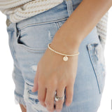 Gold bead initial bracelet