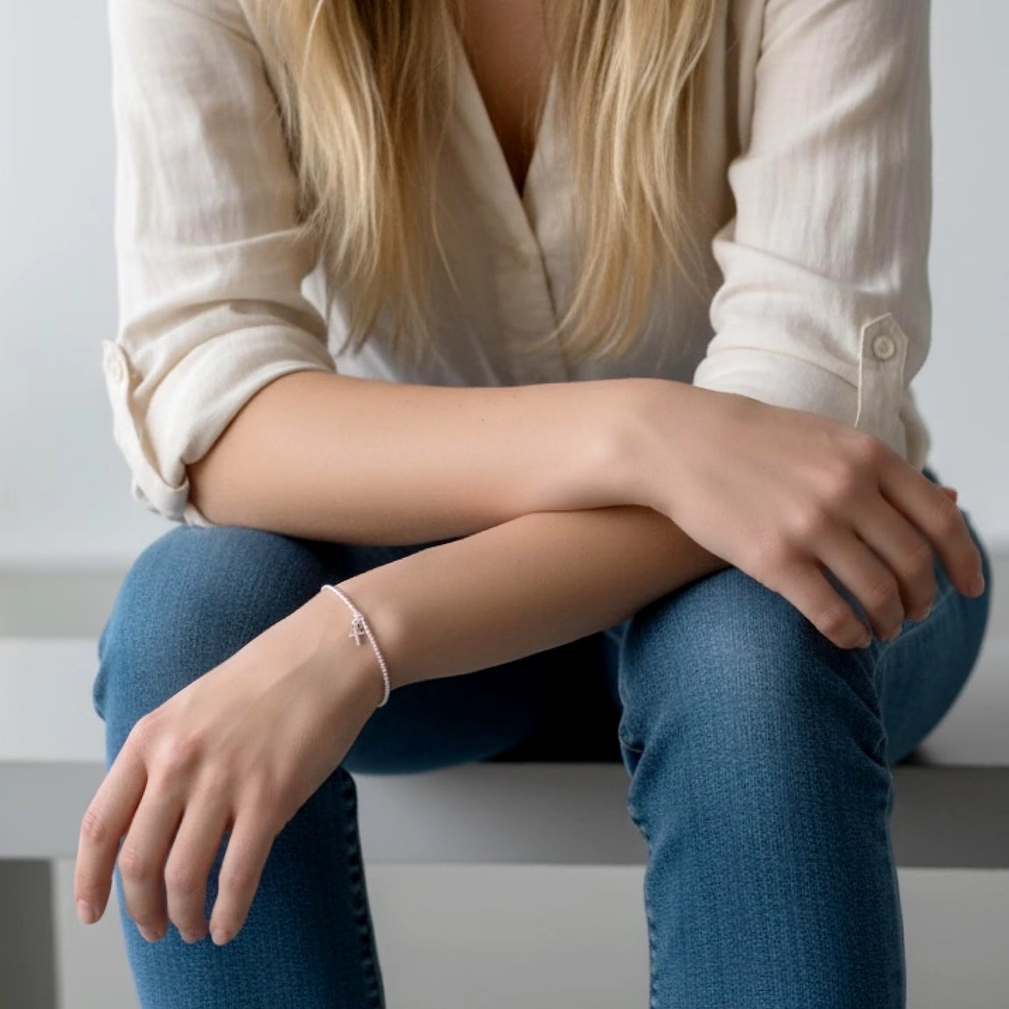 Sterling Silver Cross Charm Bracelet on Stretch Cord