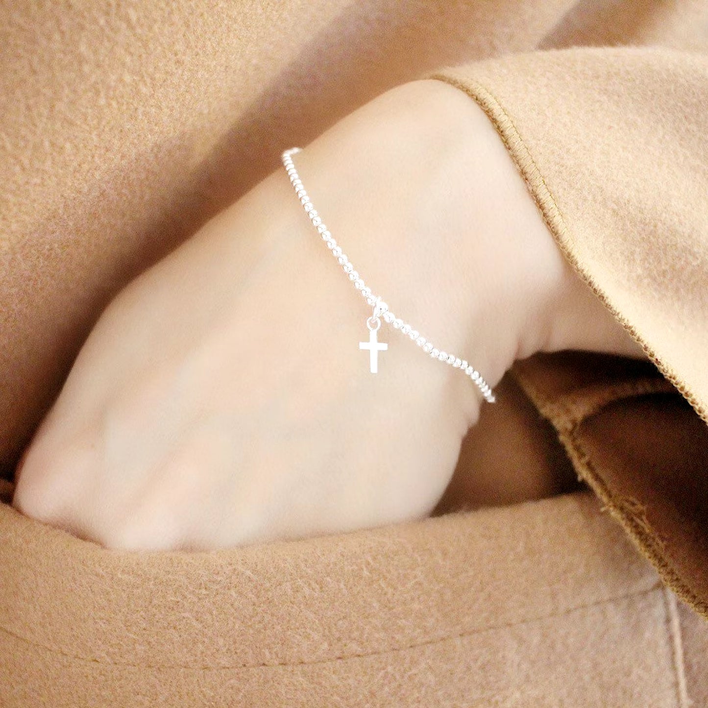 Sterling Silver Cross Charm Bracelet on Stretch Cord