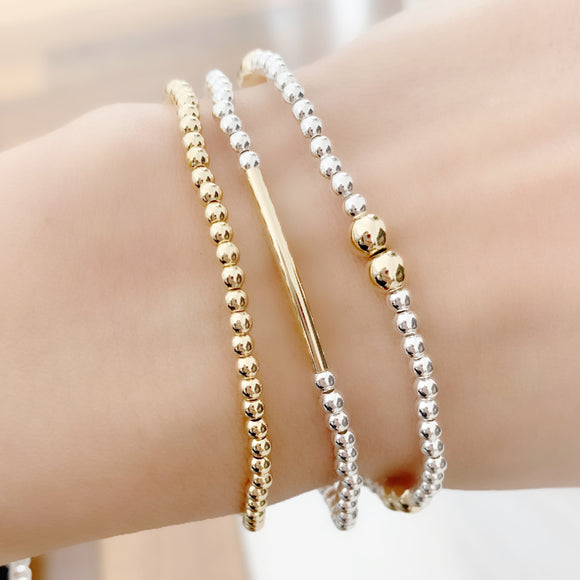 This chic and modern Dainty Gold Bracelet adds a hint of glamour to any look. Crafted from 14k gold filled Beads and sterling silver. Add a touch of elegance to your day!